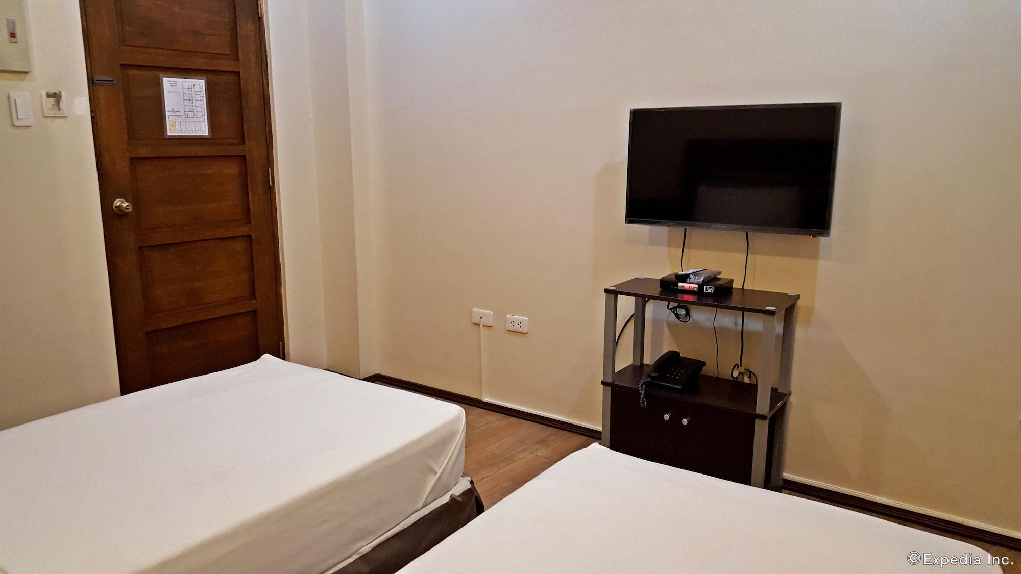 Golden Gate Suites Dumaguete City Экстерьер фото