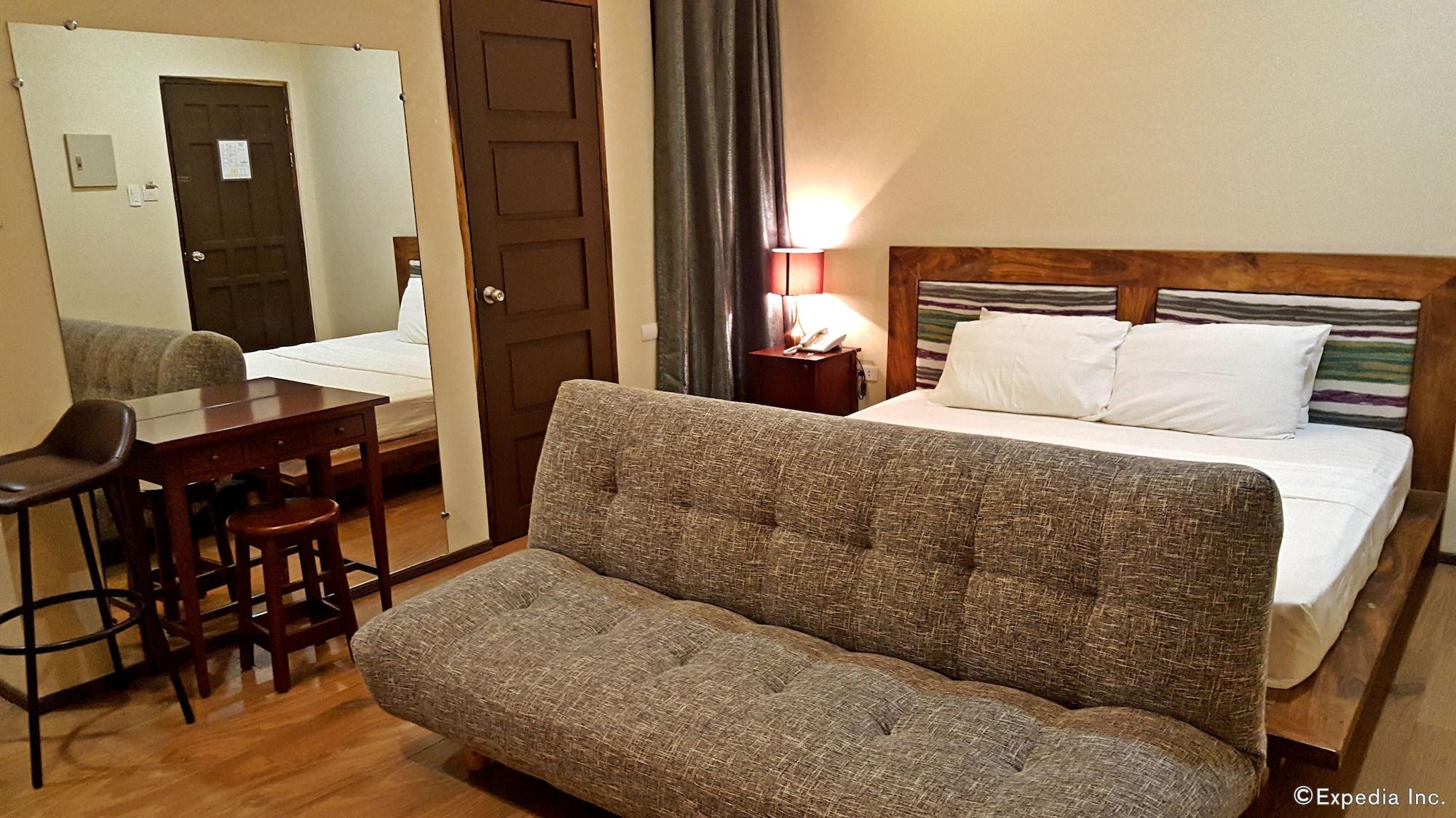 Golden Gate Suites Dumaguete City Экстерьер фото