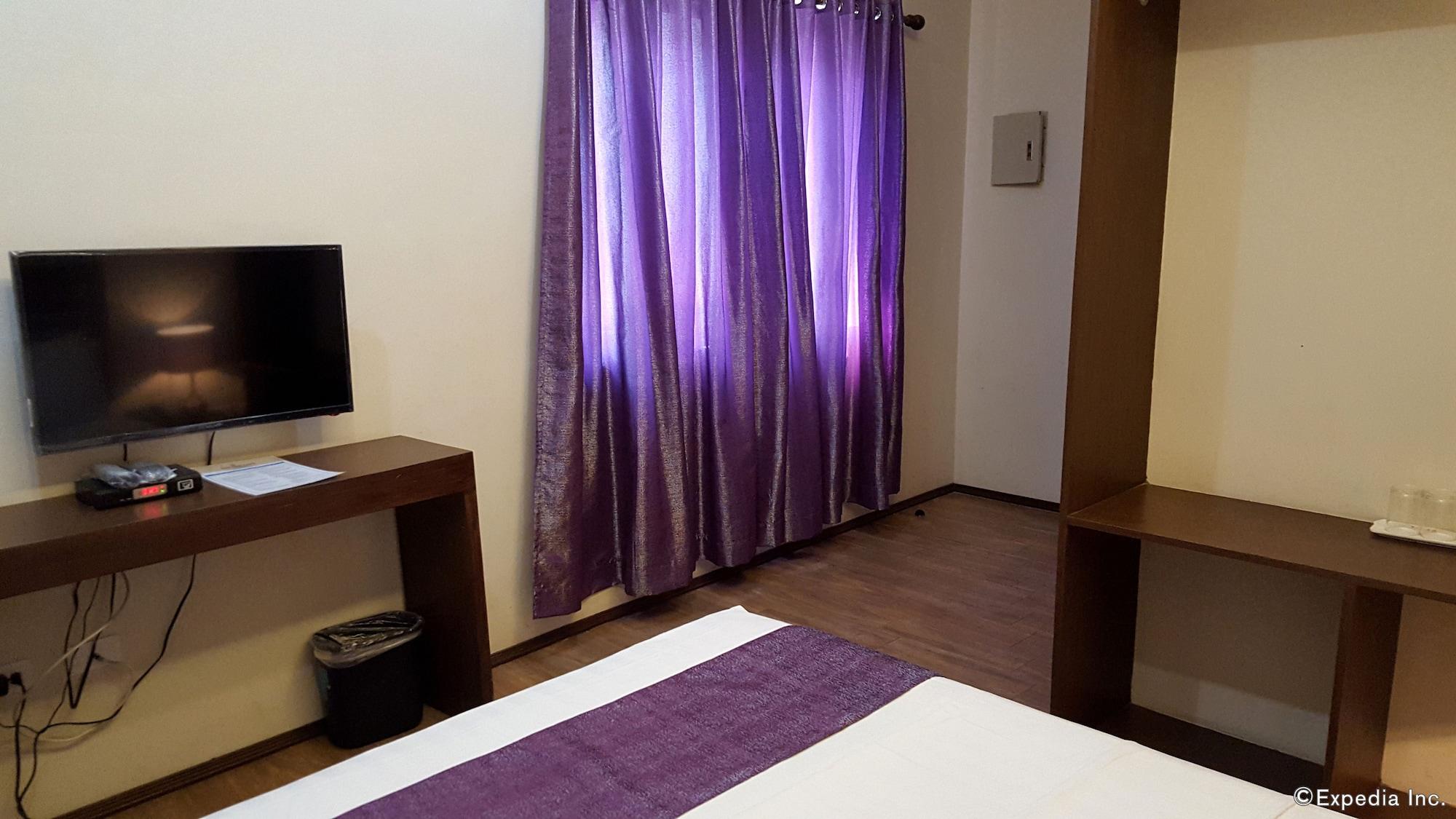 Golden Gate Suites Dumaguete City Экстерьер фото