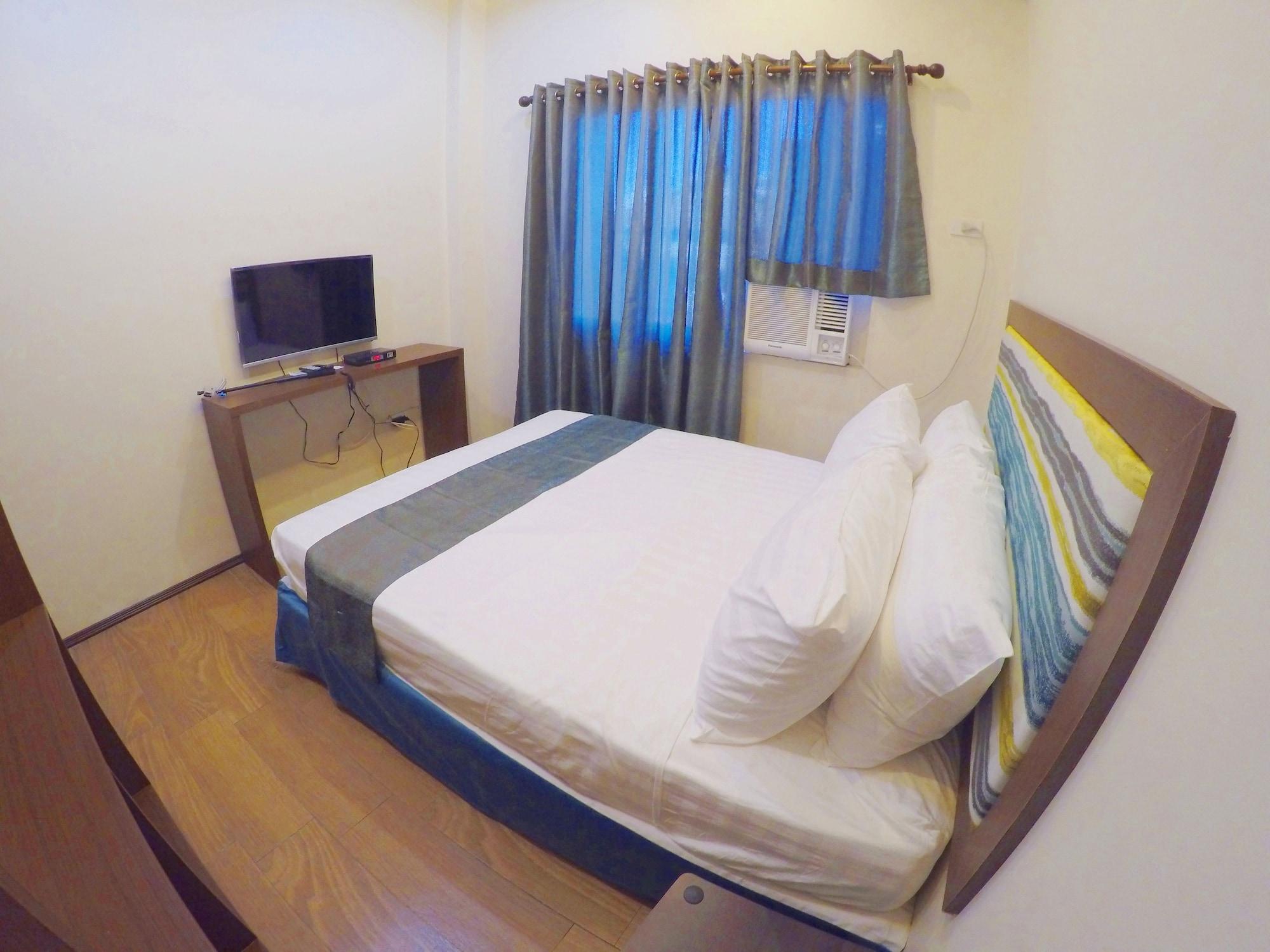 Golden Gate Suites Dumaguete City Экстерьер фото