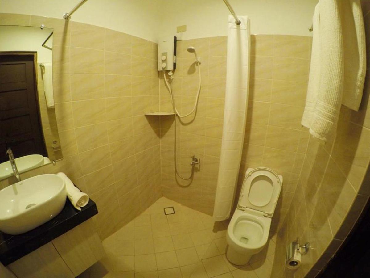 Golden Gate Suites Dumaguete City Экстерьер фото