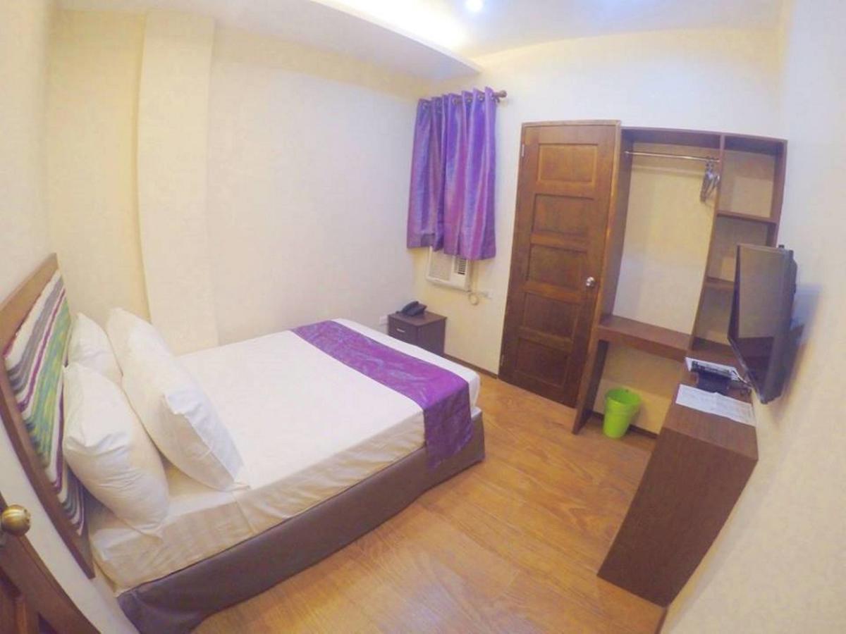 Golden Gate Suites Dumaguete City Экстерьер фото